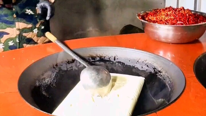 In Sichuan, stir-frying hot pot base is like playing soccer in Brazil or Argentina—almost everyone k