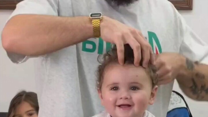 She’s great at both cuddling and cutting hair! A compilation of child hairstylists from Lebanon—why 