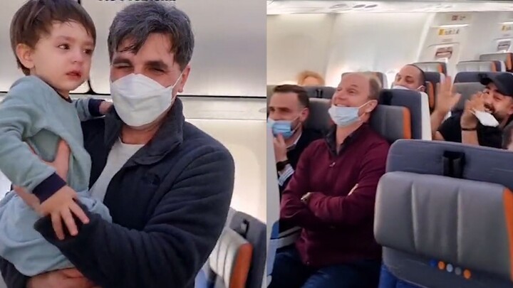 So Cute! A adorable foreign kid kept crying on a flight, so the passengers all sang “Baby Shark” tog