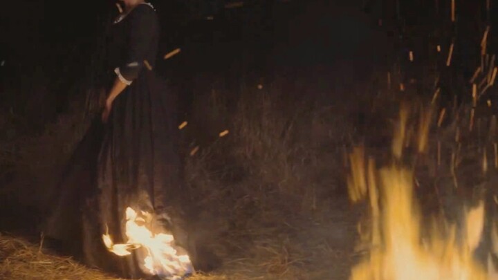 "The hem of the skirt burned in the wilderness, and we stared at each other across the campfire."