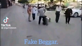 Fake beggar.