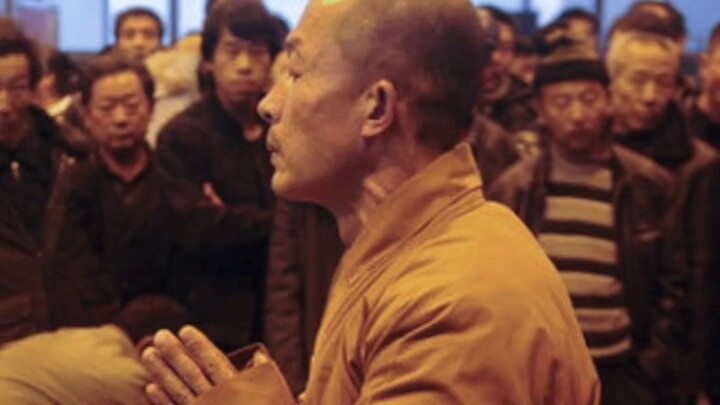 Ten years ago, monks at Taiyuan Railway Station shook hands to pray for the deceased