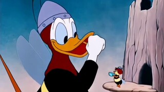 Donald Duck wants to eat honey, so he disguises himself as a bee to get it.