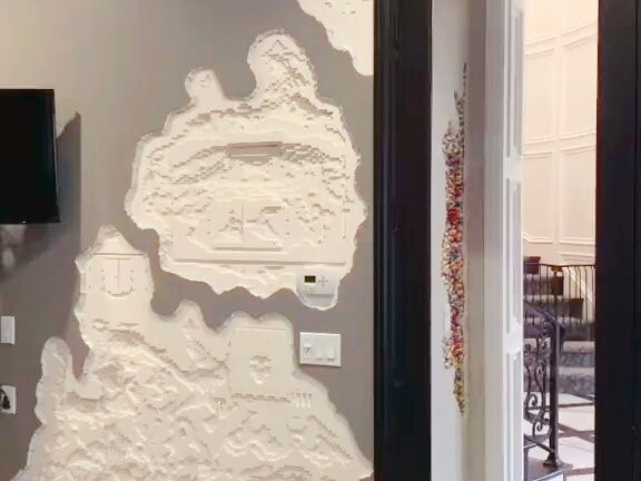 The LEGO wall of a wealthy family—poverty limits my imagination!