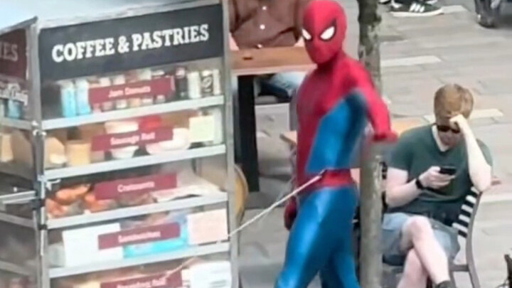 A passerby’s view of the set for “Spider-Man: No Way Home,”