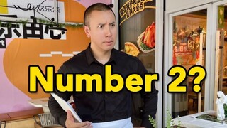 What does it mean when foreigners say Take a number 2?