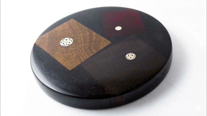 Amir Uzan - 33. Dealer button made of wood and black epoxy