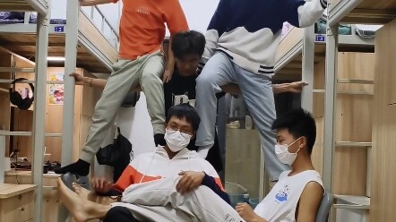 Life is tough; guys in the dorm perform for tips.