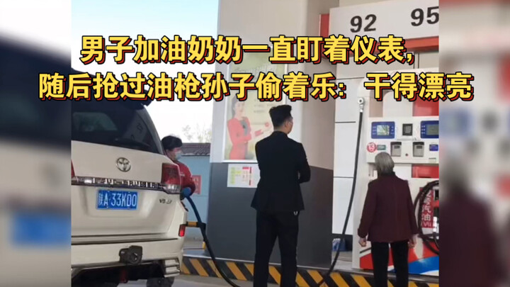 Grandma keeps staring at the gauge as the guy pumps gas—then snatches the nozzle right out of his ha