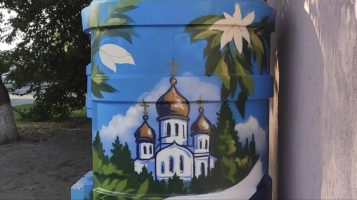 Graffiti  drawings on water barrels. 12 barrels made