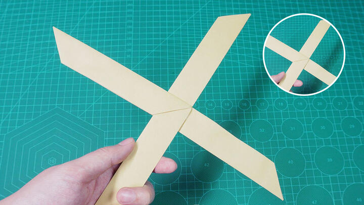 Cool handmade X-shaped boomerang that flies back on its own