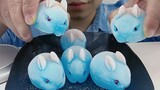 Crunchy sounds when eating blue rabbit-shaped ice