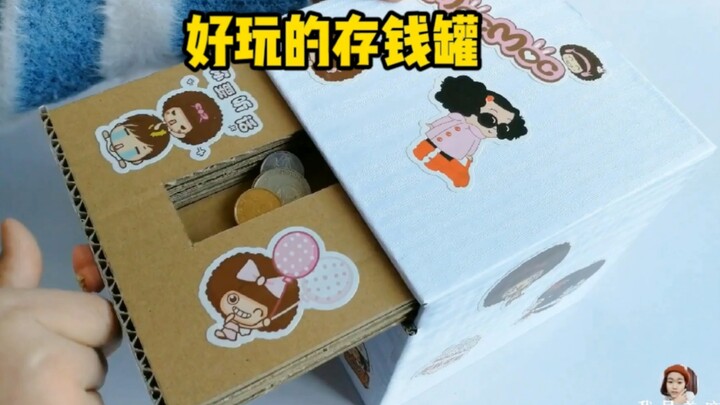 DIY a kids’ piggy bank from old cardboard boxes—coins disappear the moment they drop in, helping lit