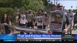 Protestors gather outside of film set for "Fast & Furious" movie in Angelino Heights