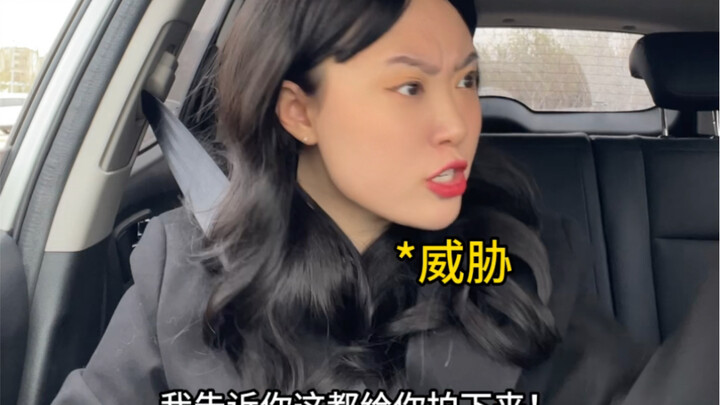 Our mother sitting in the passenger seat of our father