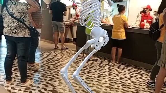 dancing skull at the jollibee