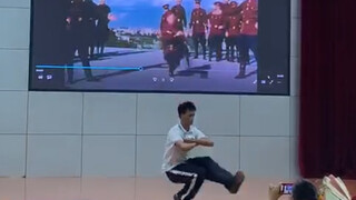 Shock! A junior high school student dances the Soviet Cossack at the graduation ceremony