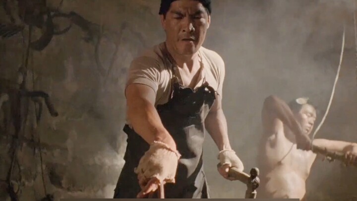 The man saw his old buddy through a rusty iron pot.