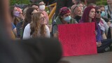 Large anti-war protestors gather at Saint Louis University