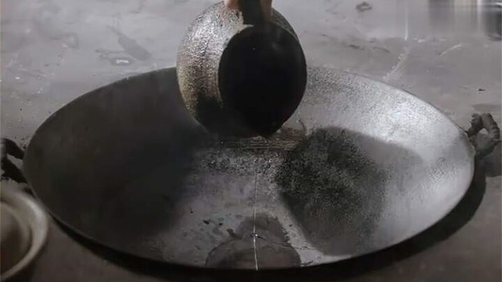 The village formed a people’s commune, and villagers ate from the same communal pot—pouring oil into