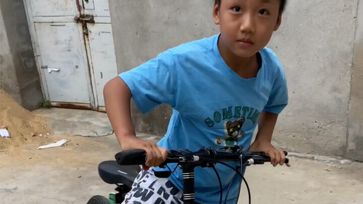 The village guardian actually knows how to modify bicycles!