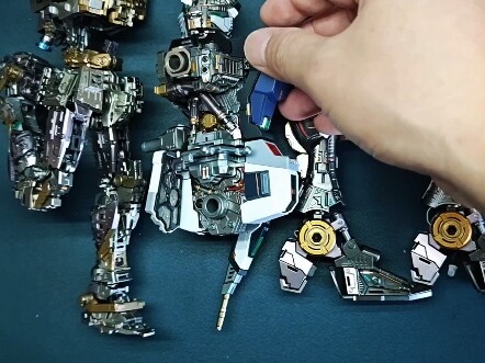 What is the significance of changing the color of Gundam models?
