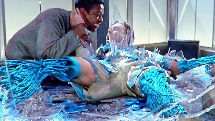 A man with an immortal body can quickly recover from any injury by swallowing glass—Time Cop