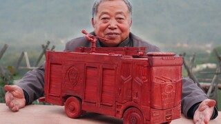 A rural grandfather built a fire truck with mortise and tenon joints. Hundreds of parts were assembl