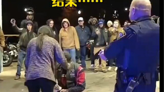 A black man in the United States was surrounded by police at gunpoint at a gas station. His girlfrie
