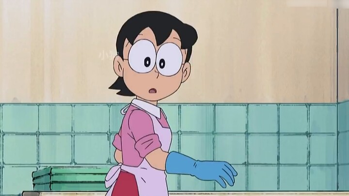 Nobita bought a bunch of things he had never seen before using the future shopping machine