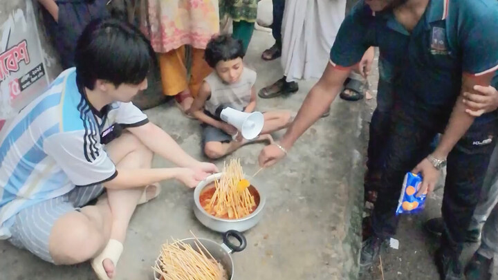 Setting up a street stall to sell Chinese "Bo Bo Chicken" in Bangladesh, one of the world's least de
