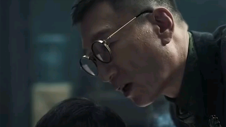 One second eating seafood and smoking a cigar, the next second being interrogated.