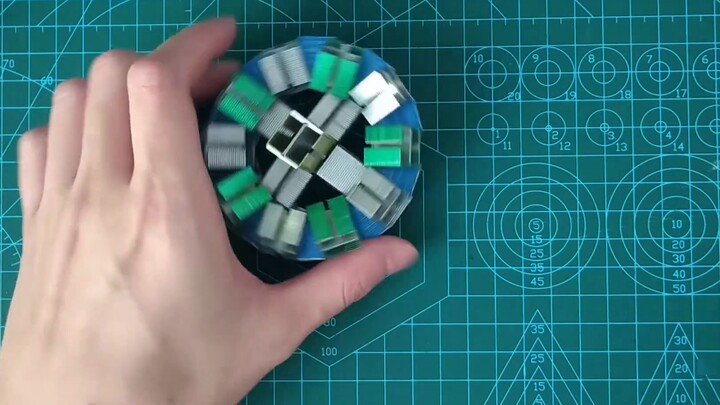 Assemble a colorful ball with staples