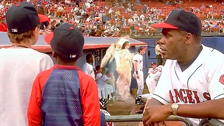 The boy actually spots an angel appearing behind the team member!