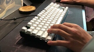 Red Dragon mech keyboard modded with lubed Akko green switches + film