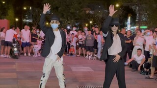 Michael Jackson imitator Cai Jun performs with street fans for the first time at Chengdu Wanda Plaza