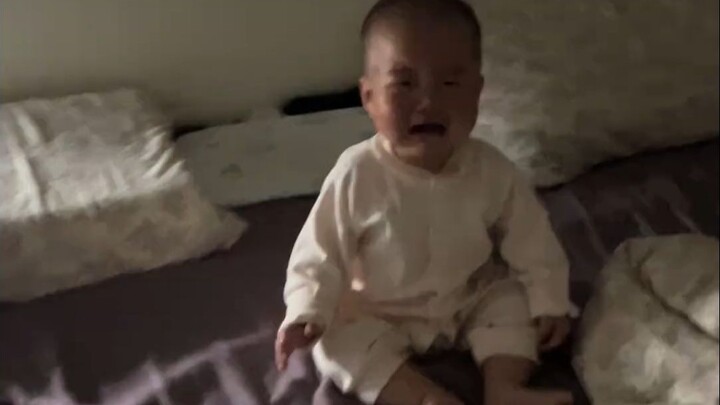 Woke up and, seeing no one around, sat up and cried.