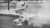 Cale yarborough does over fence at 1965 Darlington