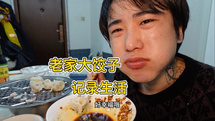 Young guy saves money by renting a small place, enjoys a few mom-made dumplings—and every bite is pu