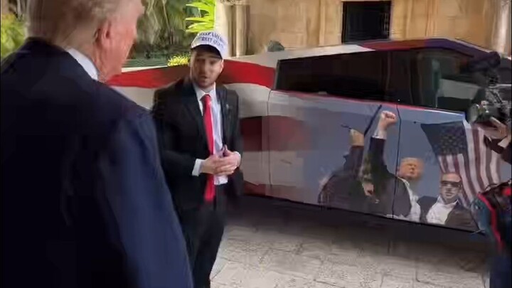 Trump Receives a Life-Size Photo Edition Tesla Cybertruck, Dances Energetically to YMCA