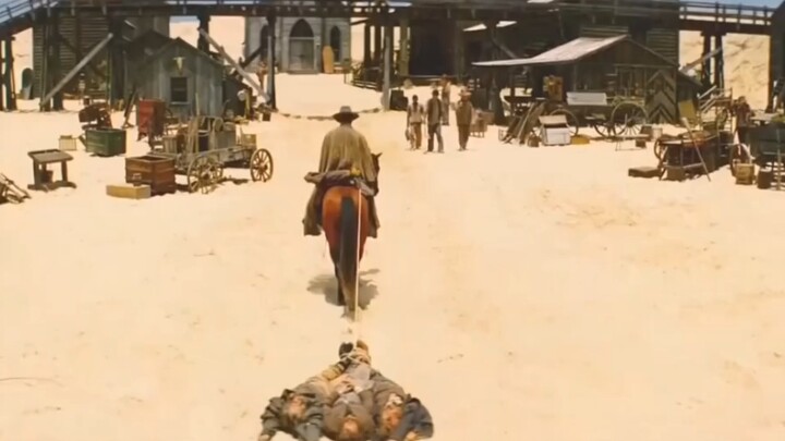 A Bounty Hunter from Hunter x Hunter drags three corpses toward the town, drawing puzzled stares fro