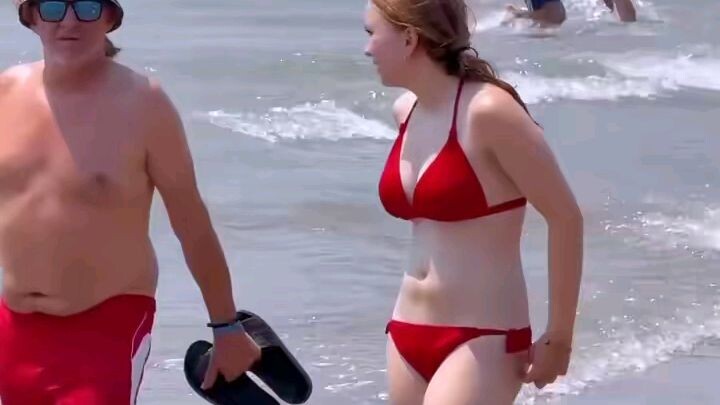 Beautiful Girls walking in Beach watching and share with Friend's