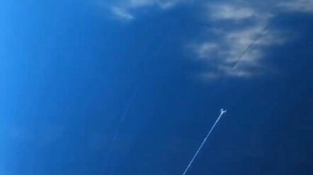 Central Academy of Fine Arts workers painted a “sky mural” on a tunnel wall—blue skies and white clo