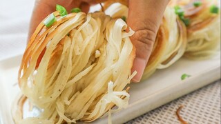 一根面条拉成2米细丝，煎一煎层层酥脆掉渣！