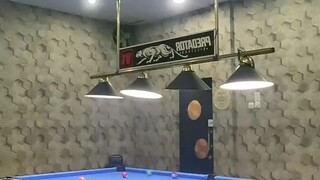 A trick shot in billiards 2