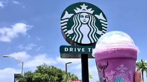 ENJOYING AN A STARBUCK'S