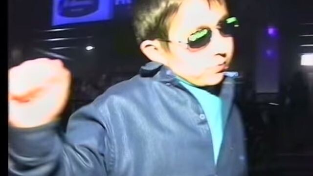 Gypsy kid dancing at club can't be bothered. 1997.