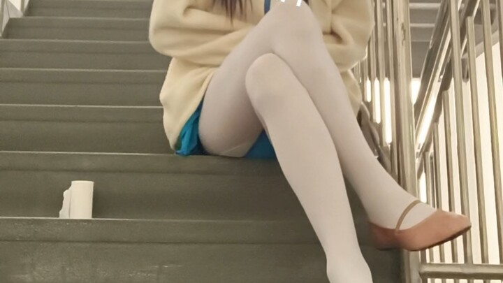 Hobbies involving dancing in a leotard and white tights in the hallway