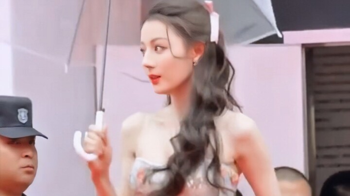 Hilarious! She wasn't invited to walk the runway at the VOGUE Gala, but the brand had her stroll dow