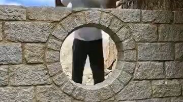 A_Secret_Wooden_Shelter_Under_Giant_Rocks